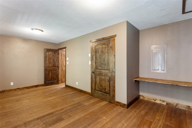 28578 Wapiti Ln, Bigfork, MT 59911 - spare room featuring wood finished floors and baseboards