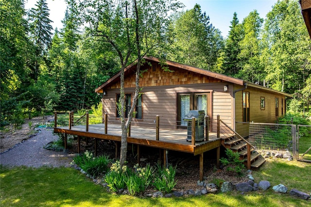 28578 Wapiti Ln, Bigfork, MT 59911 - back of house featuring a wooden deck