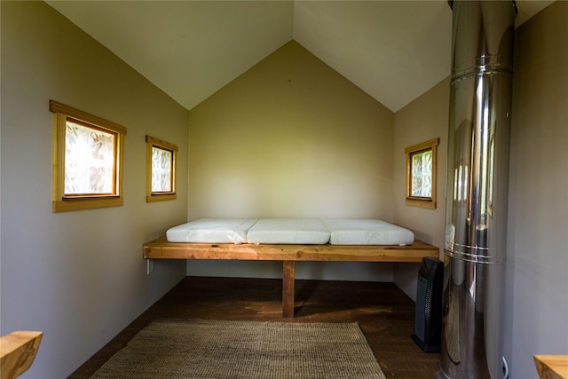 28578 Wapiti Ln, Bigfork, MT 59911 - bedroom with lofted ceiling and dark wood finished floors
