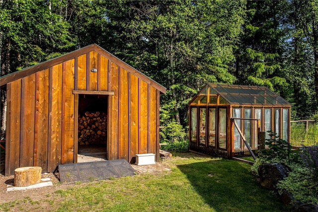 28578 Wapiti Ln, Bigfork, MT 59911 - view of greenhouse featuring a yard