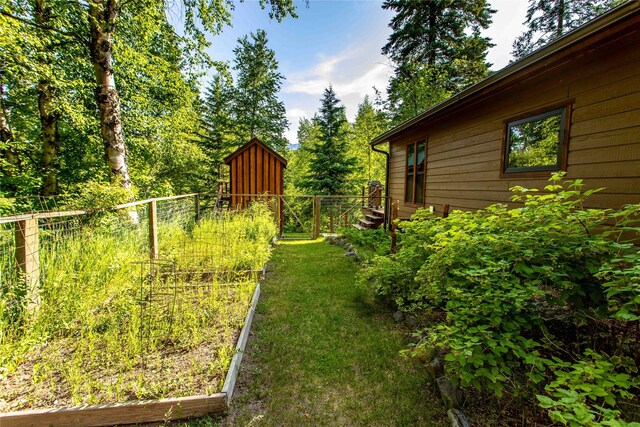 28578 Wapiti Ln, Bigfork, MT 59911 - view of yard with a garden