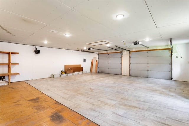 28578 Wapiti Ln, Bigfork, MT 59911 - garage featuring a garage door opener