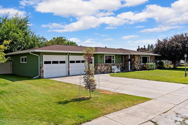 3906 Bellecrest Dr, Missoula, MT 59801 - single story home featuring stone siding, an attached garage, concrete driveway, a front lawn, and a chimney