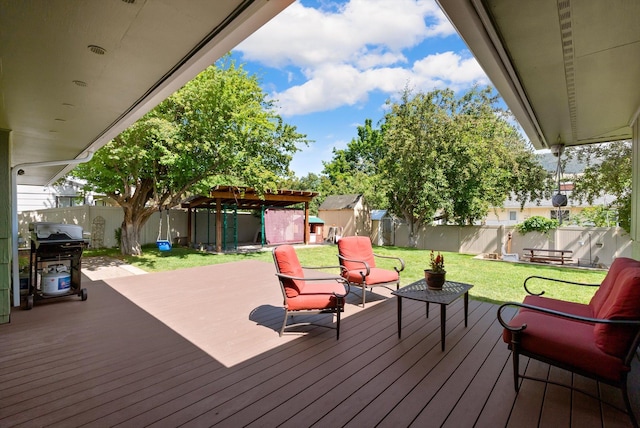 3906 Bellecrest Dr, Missoula, MT 59801 - wooden terrace with grilling area, a shed, and a fenced backyard