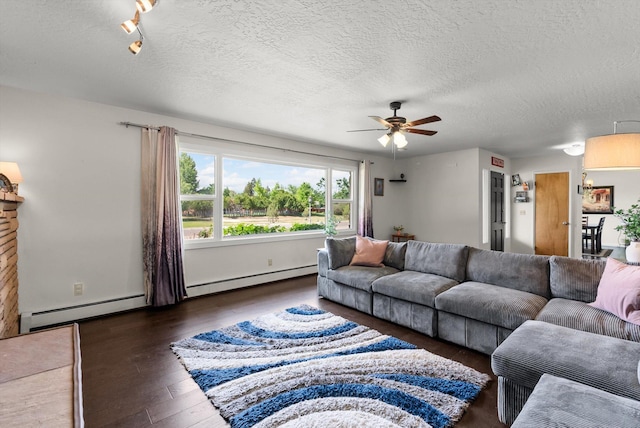 3906 Bellecrest Dr, Missoula, MT 59801 - living room with a baseboard heating unit, wood finished floors, a ceiling fan, and a textured ceiling