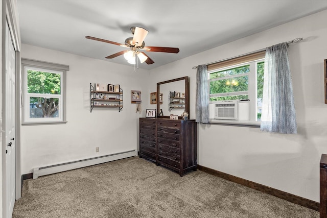3906 Bellecrest Dr, Missoula, MT 59801 - carpeted bedroom featuring baseboard heating, multiple windows, cooling unit, and ceiling fan