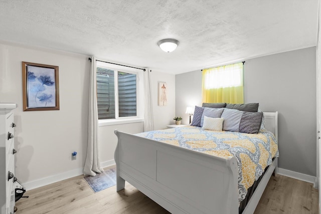 3906 Bellecrest Dr, Missoula, MT 59801 - bedroom with a textured ceiling and light wood finished floors