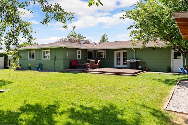 3906 Bellecrest Dr, Missoula, MT 59801 - rear view of property featuring french doors, a wooden deck, a lawn, and a shingled roof