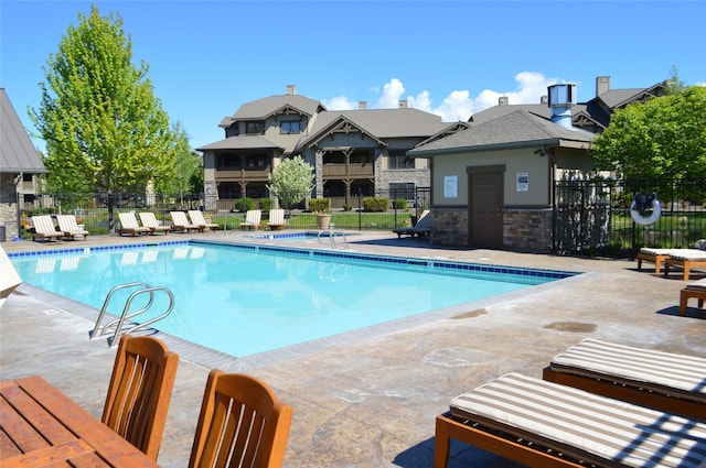 6008 St Moritz Dr Unit K, Whitefish, MT 59937 - community pool with a patio area