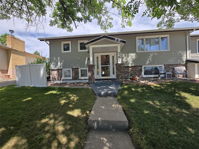 761 32nd Ave NE, Great Falls, MT 59404 - raised ranch with a front yard and stone siding