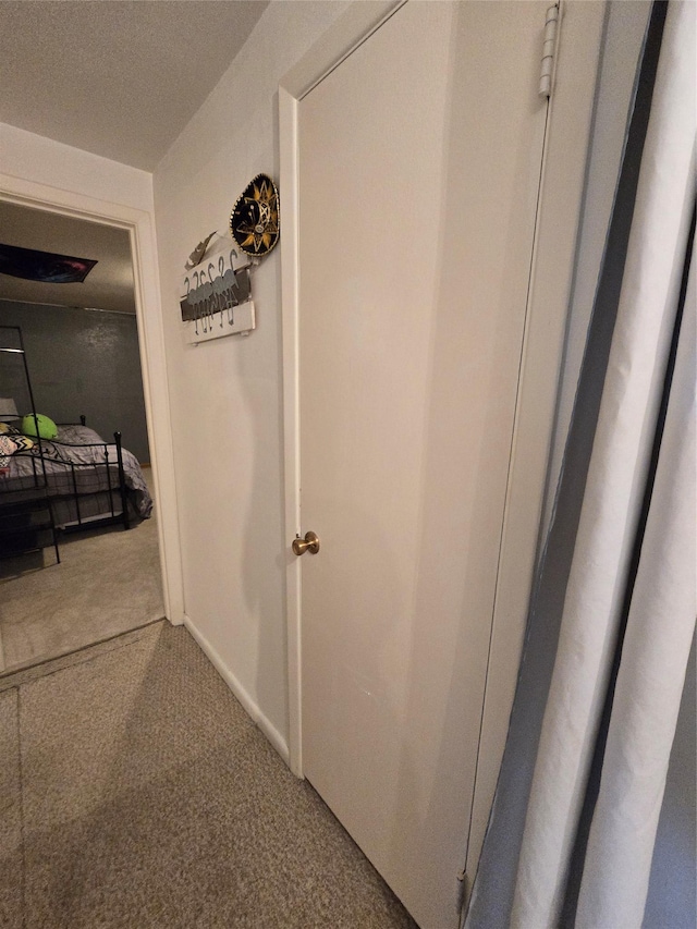 761 32nd Ave NE, Great Falls, MT 59404 - hall featuring carpet flooring and a textured ceiling