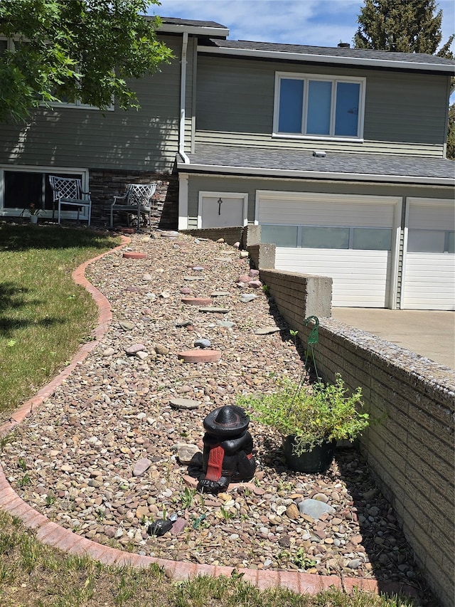 761 32nd Ave NE, Great Falls, MT 59404 - view of front of house with an attached garage and concrete driveway