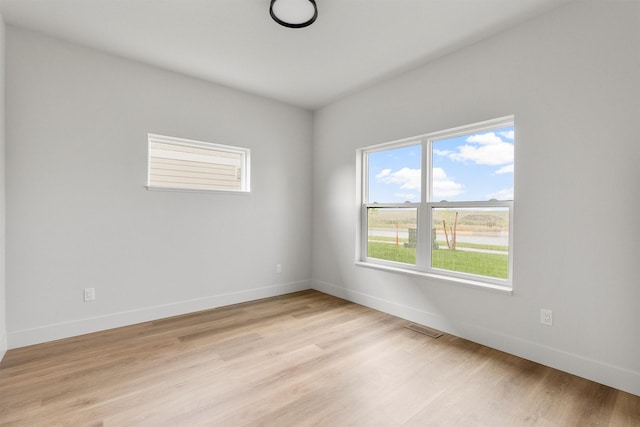 5465 Remington Dr, Missoula, MT 59808 - spare room featuring light wood-type flooring