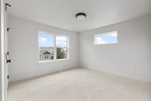 5465 Remington Dr, Missoula, MT 59808 - carpeted empty room with healthy amount of natural light