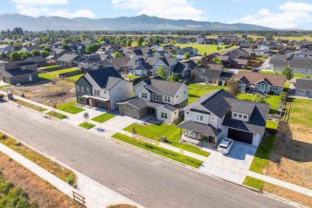 5465 Remington Dr, Missoula, MT 59808 - aerial perspective of suburban area featuring a mountainous background
