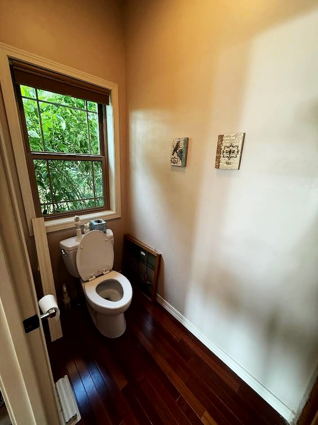 151 Whisper Ridge Dr, Bigfork, MT 59911 - bathroom featuring baseboards and wood finished floors