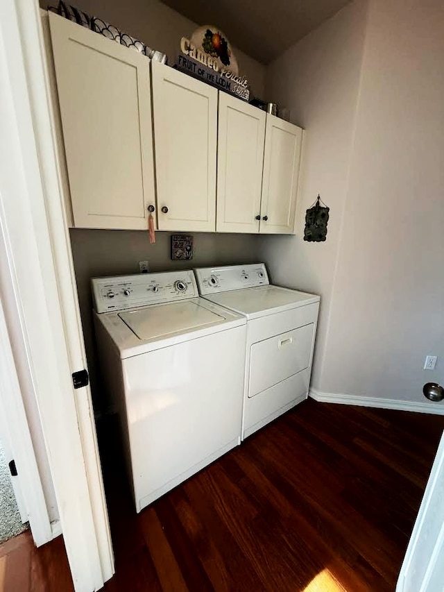 151 Whisper Ridge Dr, Bigfork, MT 59911 - laundry area featuring separate washer and dryer, dark wood-type flooring, and cabinet space