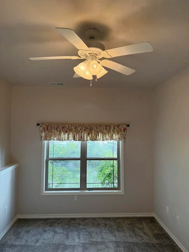 151 Whisper Ridge Dr, Bigfork, MT 59911 - carpeted spare room with a ceiling fan and baseboards