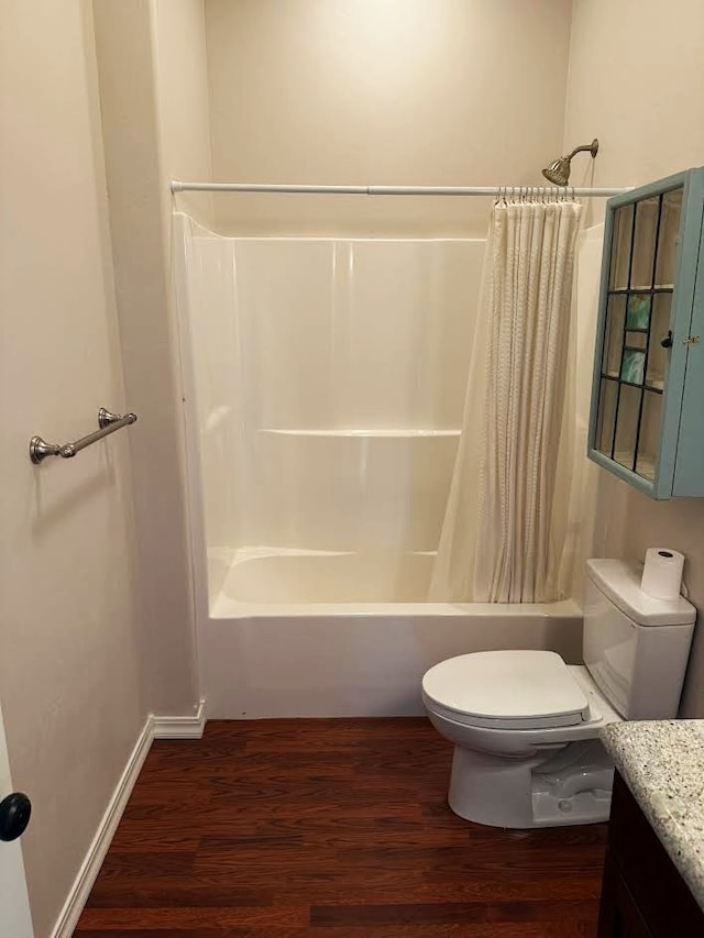 151 Whisper Ridge Dr, Bigfork, MT 59911 - bathroom with vanity, wood finished floors, and shower / tub combo with curtain