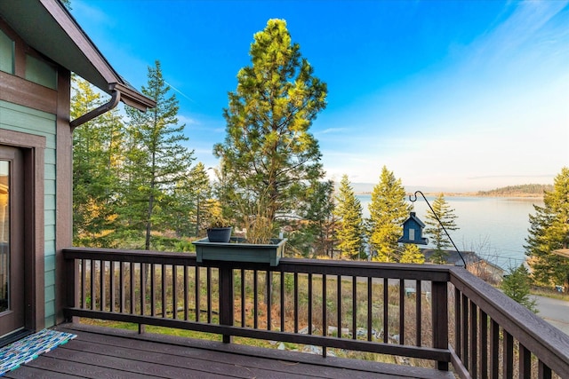151 Whisper Ridge Dr, Bigfork, MT 59911 - wooden terrace with a water view