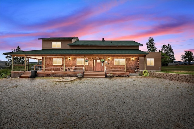 674 Porter Hill Rd, Stevensville, MT 59870 - view of front of home with a porch and a metal roof
