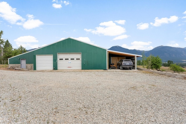 674 Porter Hill Rd, Stevensville, MT 59870 - garage featuring a garage and a mountain view