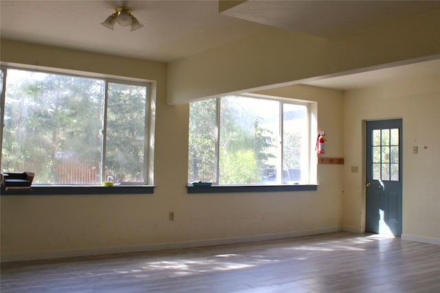11740 Gopher Dr, Missoula, MT 59808 - spare room with wood finished floors and baseboards