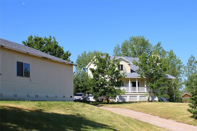 11740 Gopher Dr, Missoula, MT 59808 - view of green lawn with covered porch