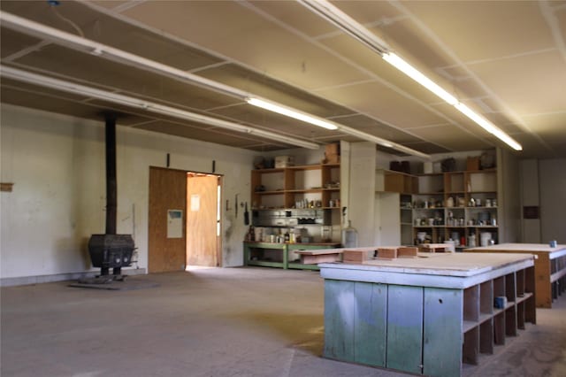 11740 Gopher Dr, Missoula, MT 59808 - garage with a wood stove