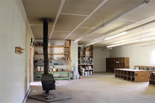 11740 Gopher Dr, Missoula, MT 59808 - garage with a wood stove