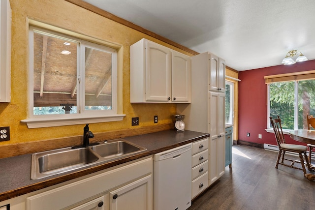 670 Potter Creek Rd, Olney, MT 59927 - kitchen featuring dishwasher, dark countertops, white cabinetry, dark wood-type flooring, and a baseboard radiator