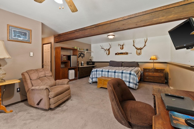 670 Potter Creek Rd, Olney, MT 59927 - bedroom featuring carpet floors, beam ceiling, and freestanding refrigerator
