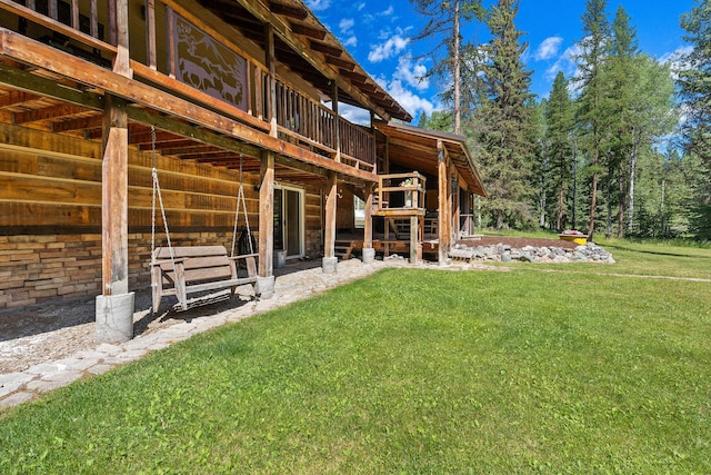 670 Potter Creek Rd, Olney, MT 59927 - rear view of property with an exterior structure and an outdoor structure