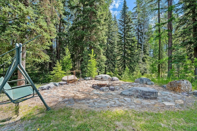 670 Potter Creek Rd, Olney, MT 59927 - view of yard featuring a forest view