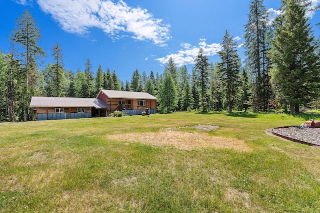 670 Potter Creek Rd, Olney, MT 59927 - view of green lawn with a wooded view