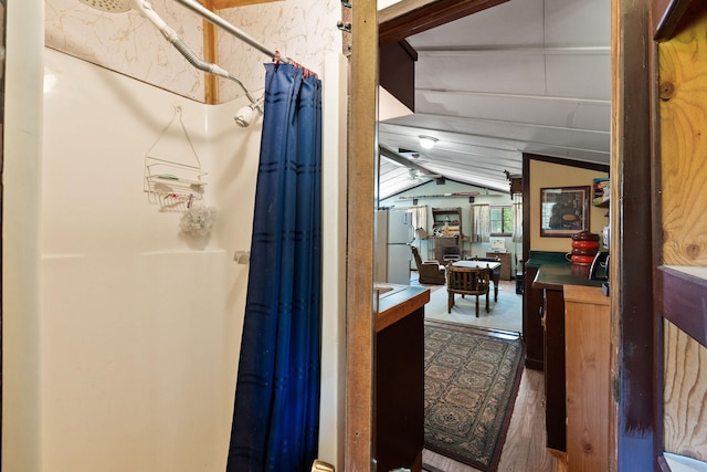 670 Potter Creek Rd, Olney, MT 59927 - corridor with vaulted ceiling and wood finished floors
