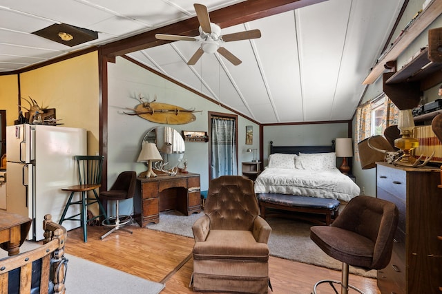 670 Potter Creek Rd, Olney, MT 59927 - bedroom featuring freestanding refrigerator and wood finished floors