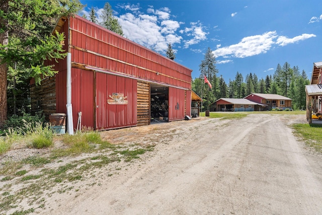 670 Potter Creek Rd, Olney, MT 59927 - view of pole building with dirt driveway