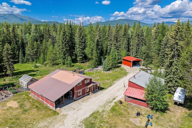 670 Potter Creek Rd, Olney, MT 59927 - aerial view of property and surrounding area with a mountainous background