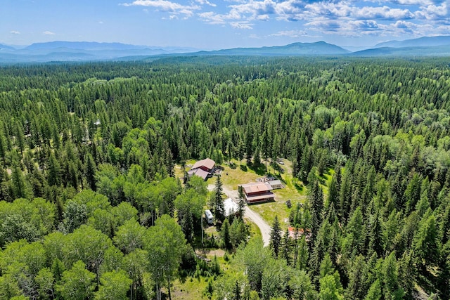670 Potter Creek Rd, Olney, MT 59927 - bird's eye view of a forest and a mountain backdrop