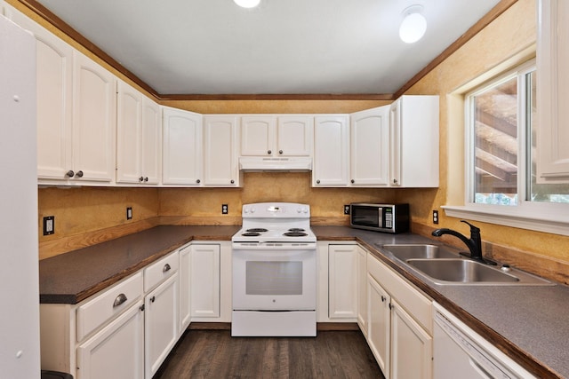670 Potter Creek Rd, Olney, MT 59927 - kitchen with white appliances, under cabinet range hood, white cabinetry, and dark countertops