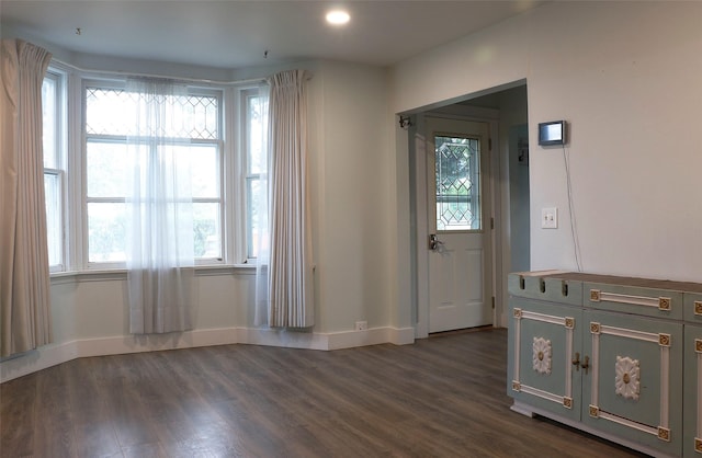319 2nd St SW, Choteau, MT 59422 - spare room with dark wood-style floors and recessed lighting