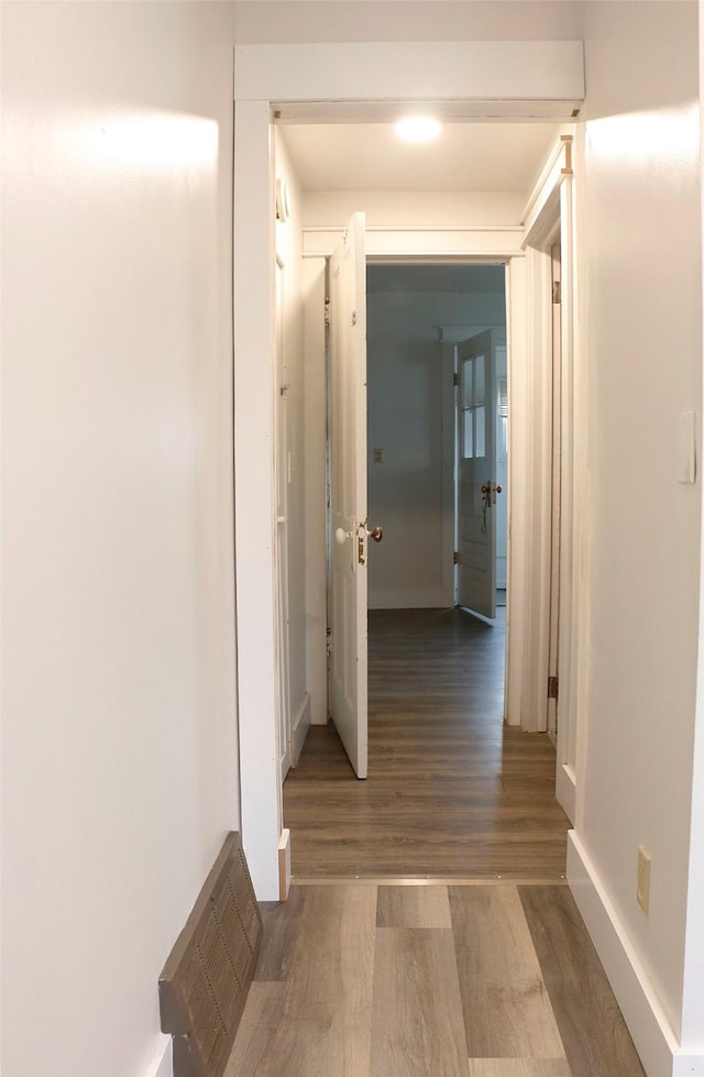 319 2nd St SW, Choteau, MT 59422 - corridor featuring wood finished floors