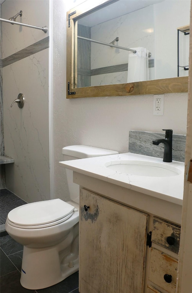 319 2nd St SW, Choteau, MT 59422 - bathroom featuring a shower stall and vanity