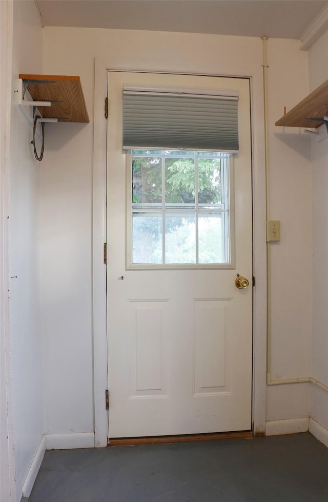 319 2nd St SW, Choteau, MT 59422 - doorway to outside with baseboards