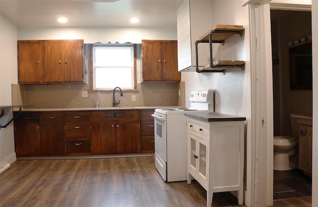 319 2nd St SW, Choteau, MT 59422 - kitchen featuring electric range, tasteful backsplash, open shelves, dark wood-style floors, and recessed lighting