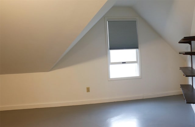 319 2nd St SW, Choteau, MT 59422 - bonus room with lofted ceiling and concrete flooring