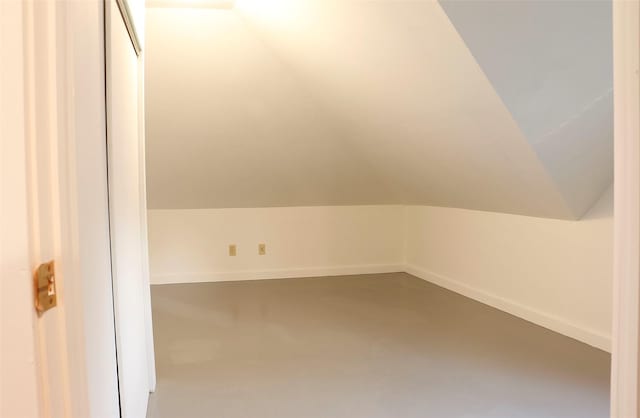 319 2nd St SW, Choteau, MT 59422 - bonus room with lofted ceiling and concrete floors