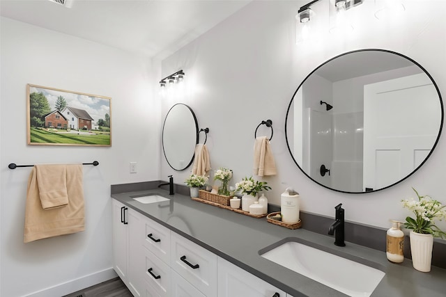 417 I St, Townsend, MT 59644 - bathroom with double vanity and baseboards