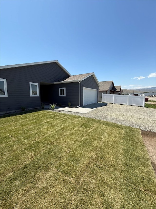 417 I St, Townsend, MT 59644 - single story home with concrete driveway and a garage